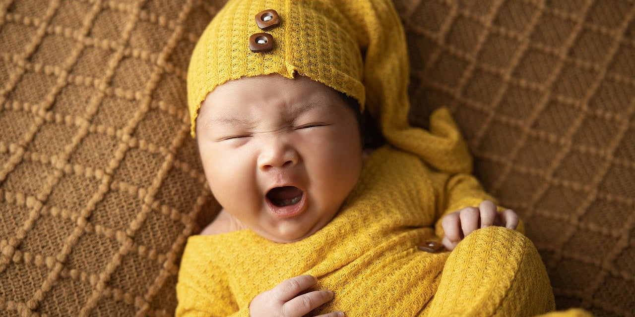 Newborn-Hand-and-Feet-Casting-yawn