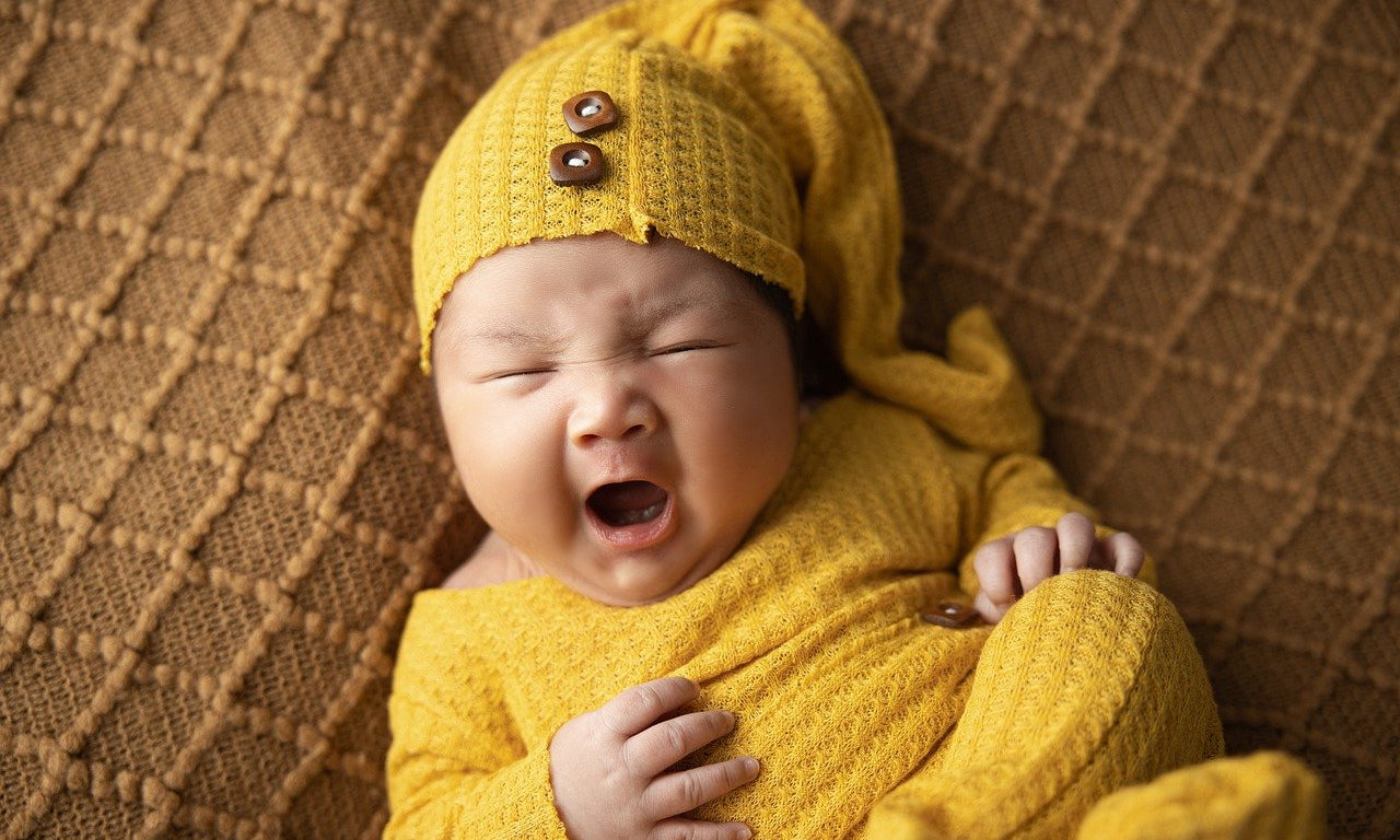 Newborn-Hand-and-Feet-Casting-yawn